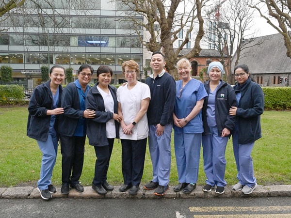 Group of nurses Eye and Ear Hospital standing together outside